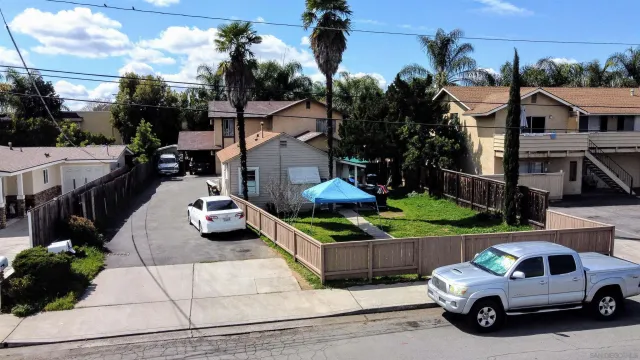 a car parked in front of a house