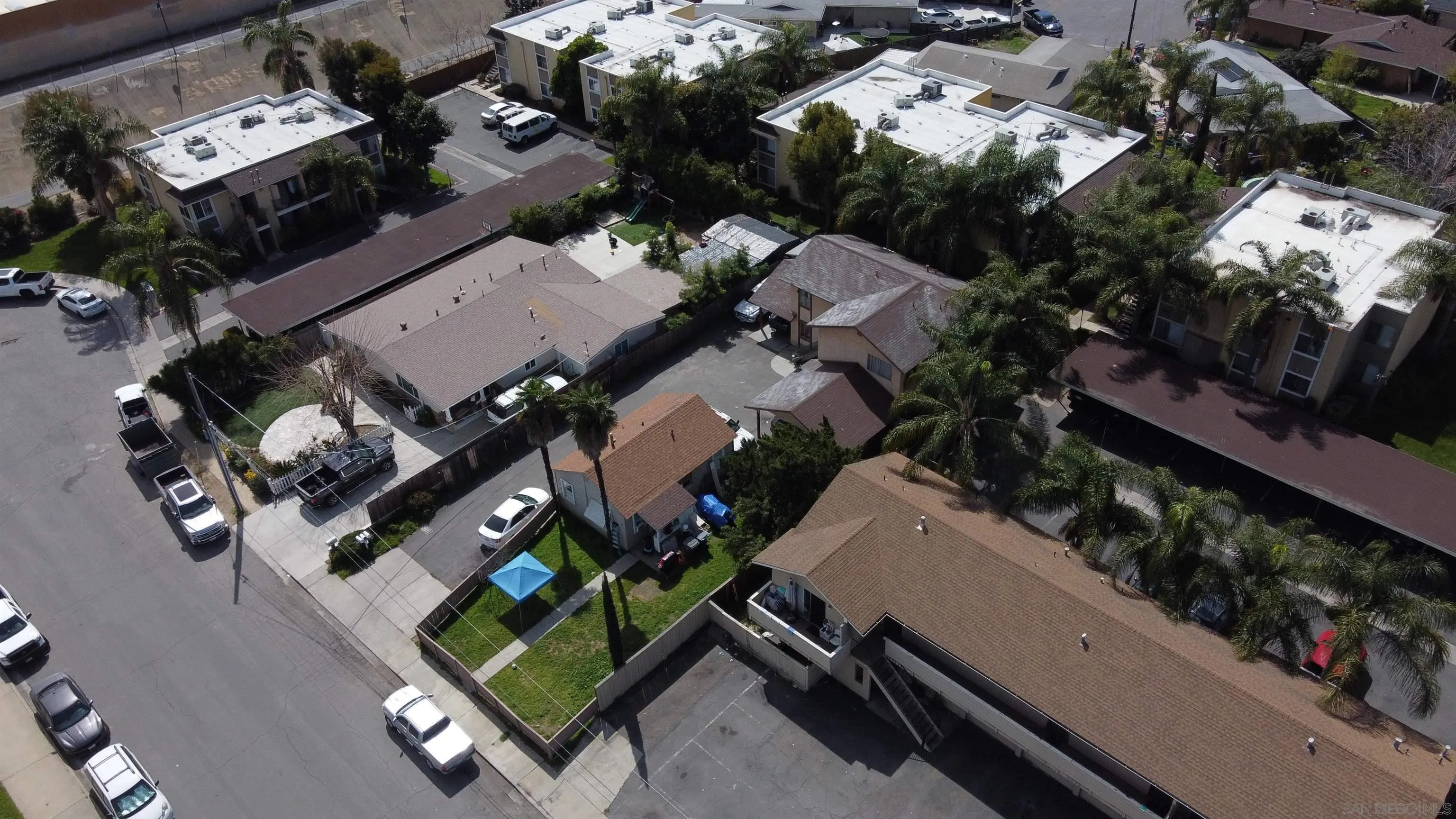 565 North Beech Street Escondido, CA 92025 - Photo 21 of 24 an aerial view of multiple houses with yard
