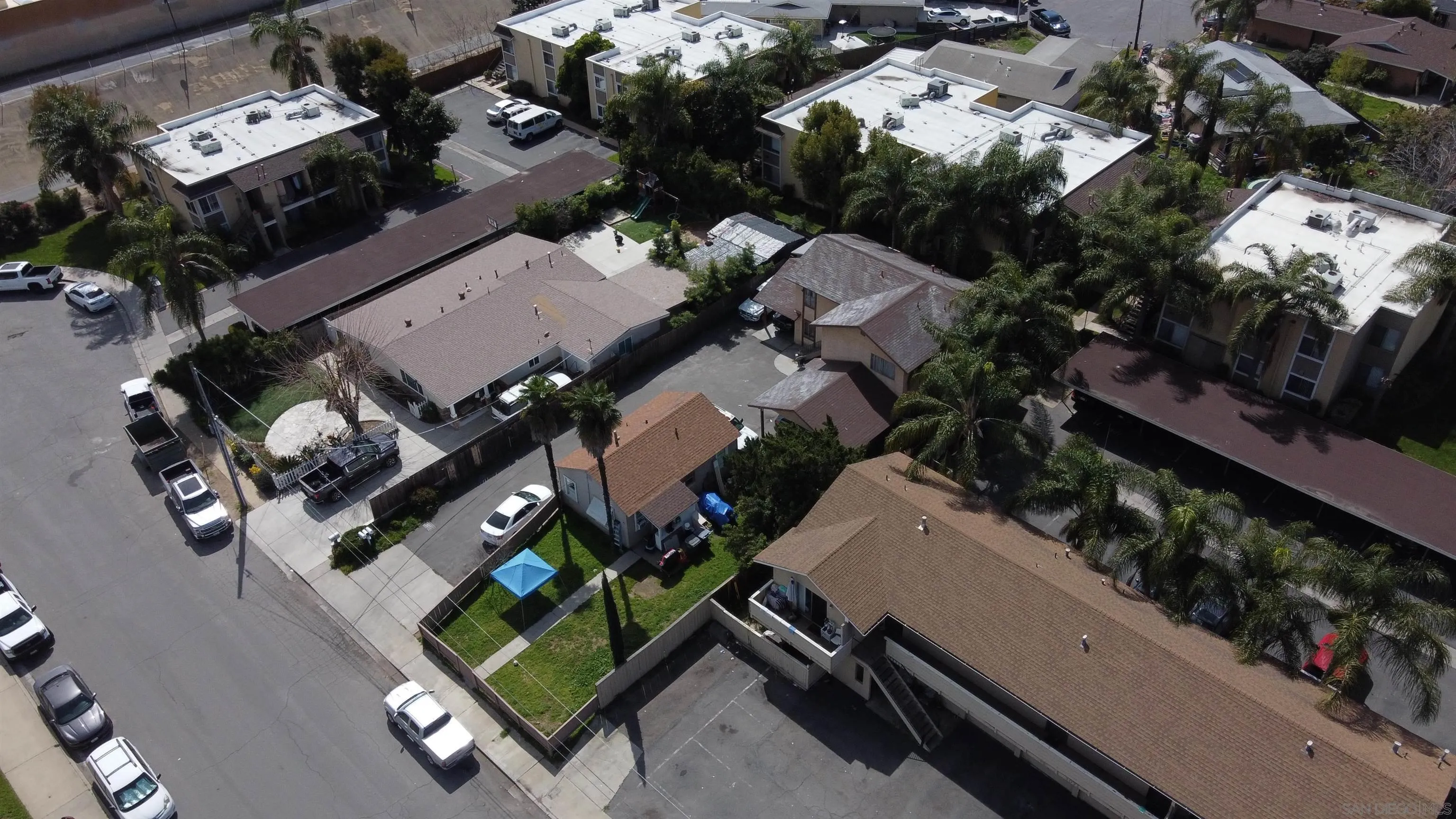 565 North Beech Street Escondido, CA 92025 - Photo 22 of 24 an aerial view of multiple houses with yard