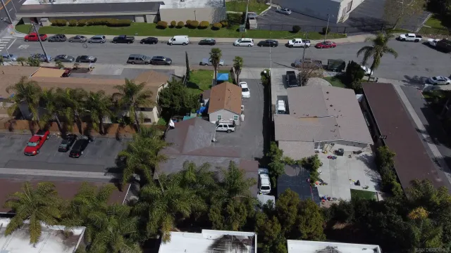 an aerial view of a houses with outdoor space