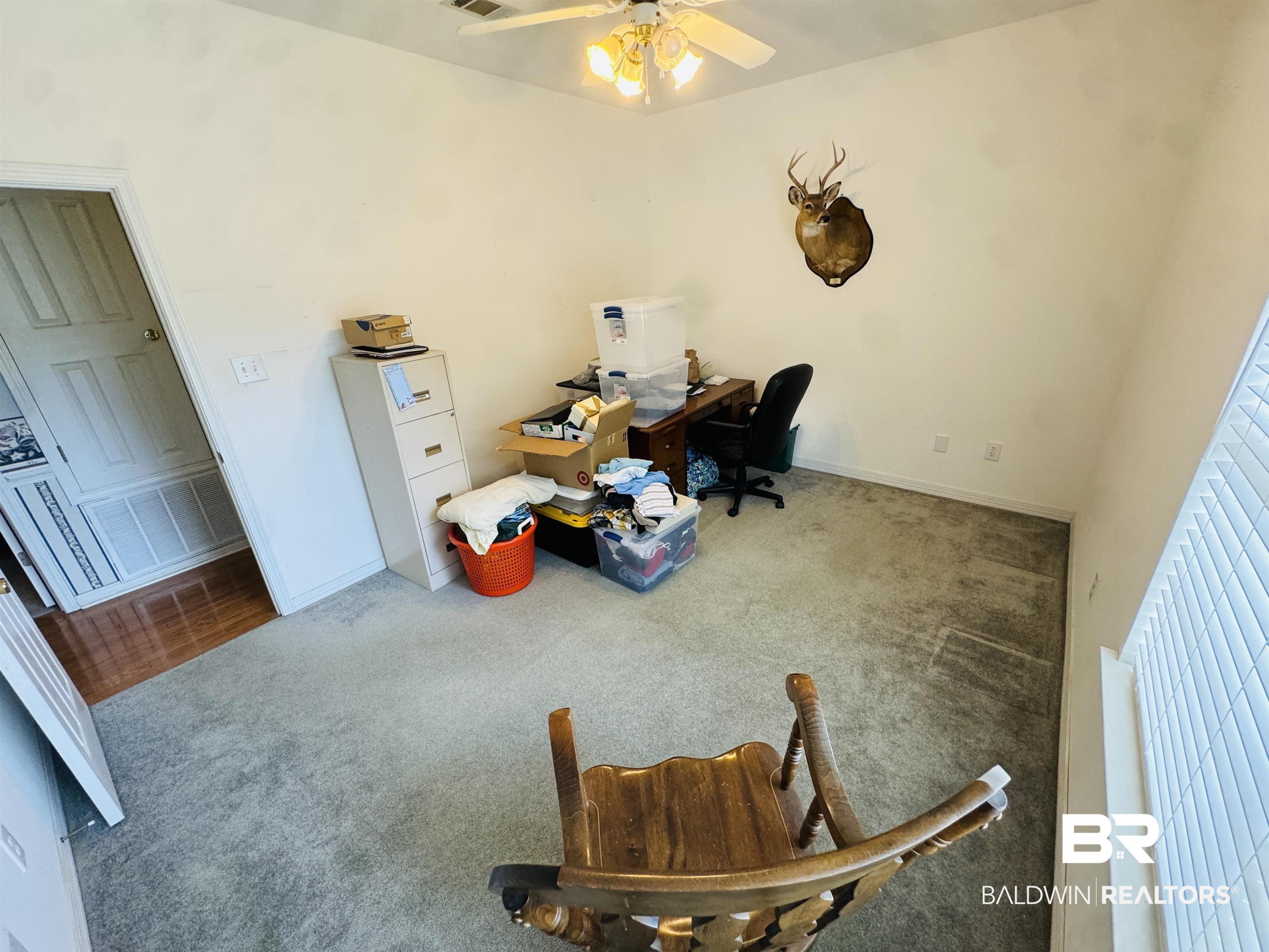 13795 White Road Silverhill, AL 36576 - Photo 52 of 99 Office area with carpet and ceiling fan
