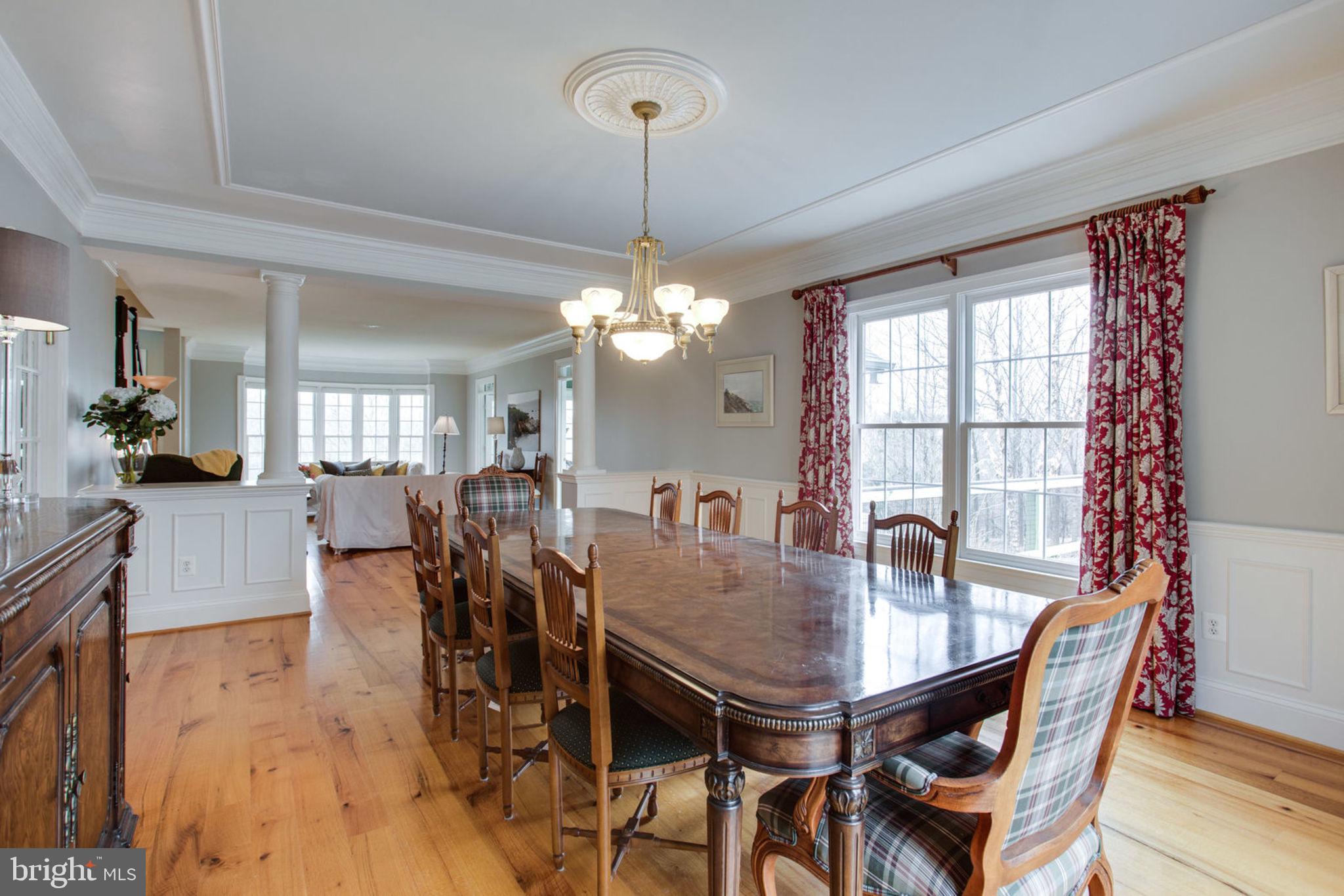 18621 Thundercloud Road Boyds, MD 20841 - Photo 11 of 83 a view of a dining room with furniture window and wooden floor