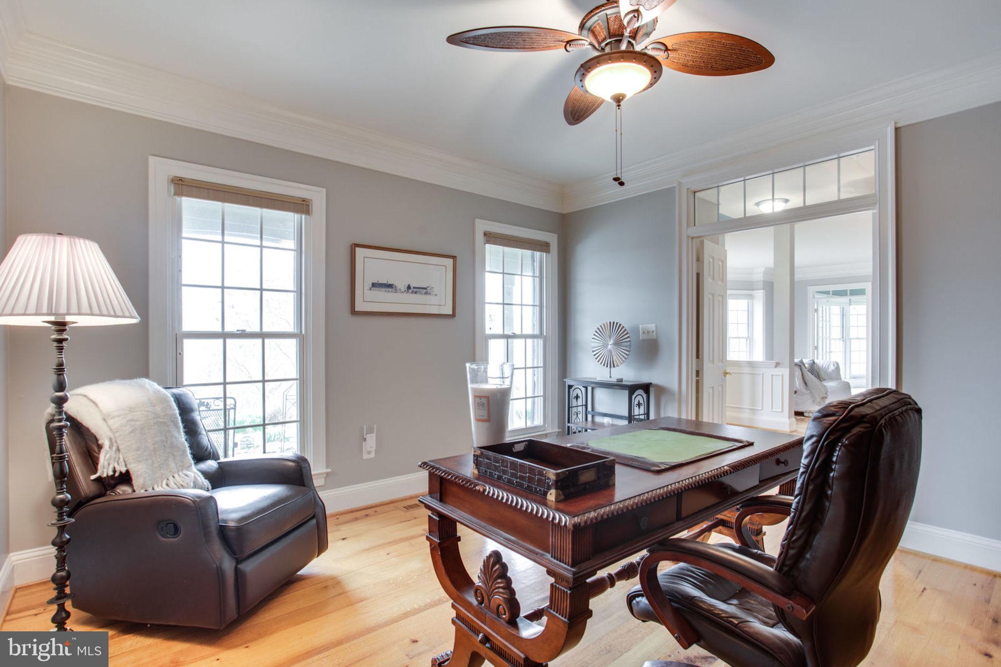 18621 Thundercloud Road Boyds, MD 20841 - Photo 14 of 83 a living room with furniture a chandelier and a window