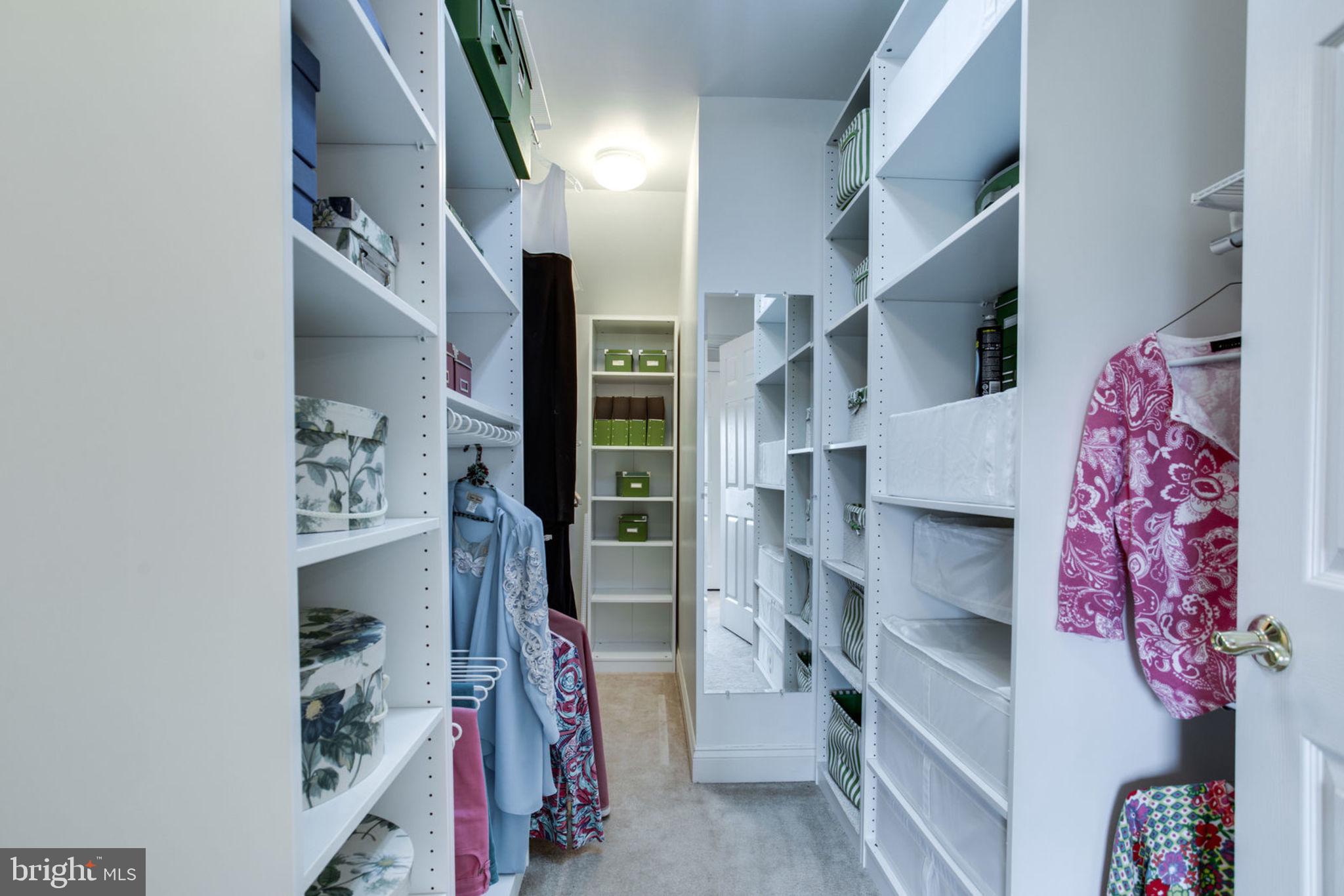 18621 Thundercloud Road Boyds, MD 20841 - Photo 43 of 83 a view of walk in closet with clothes and shoes