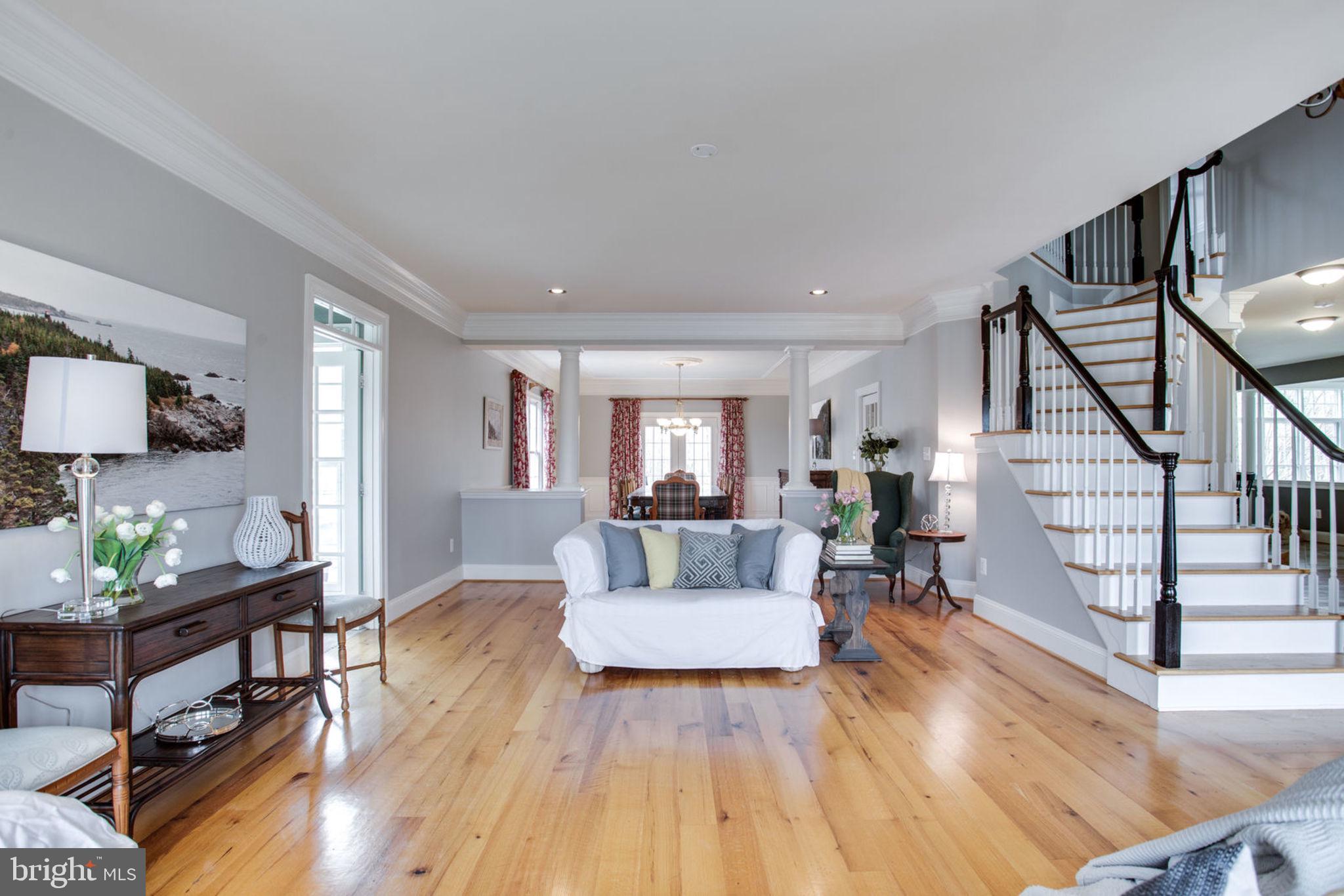 18621 Thundercloud Road Boyds, MD 20841 - Photo 6 of 83 a living room with furniture and a wooden floor