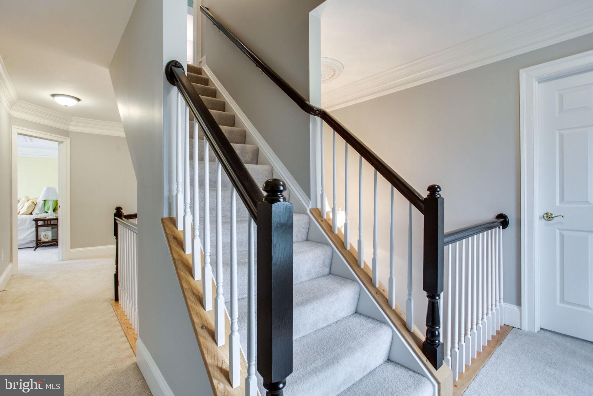 18621 Thundercloud Road Boyds, MD 20841 - Photo 58 of 83 a view of a hallway with staircase