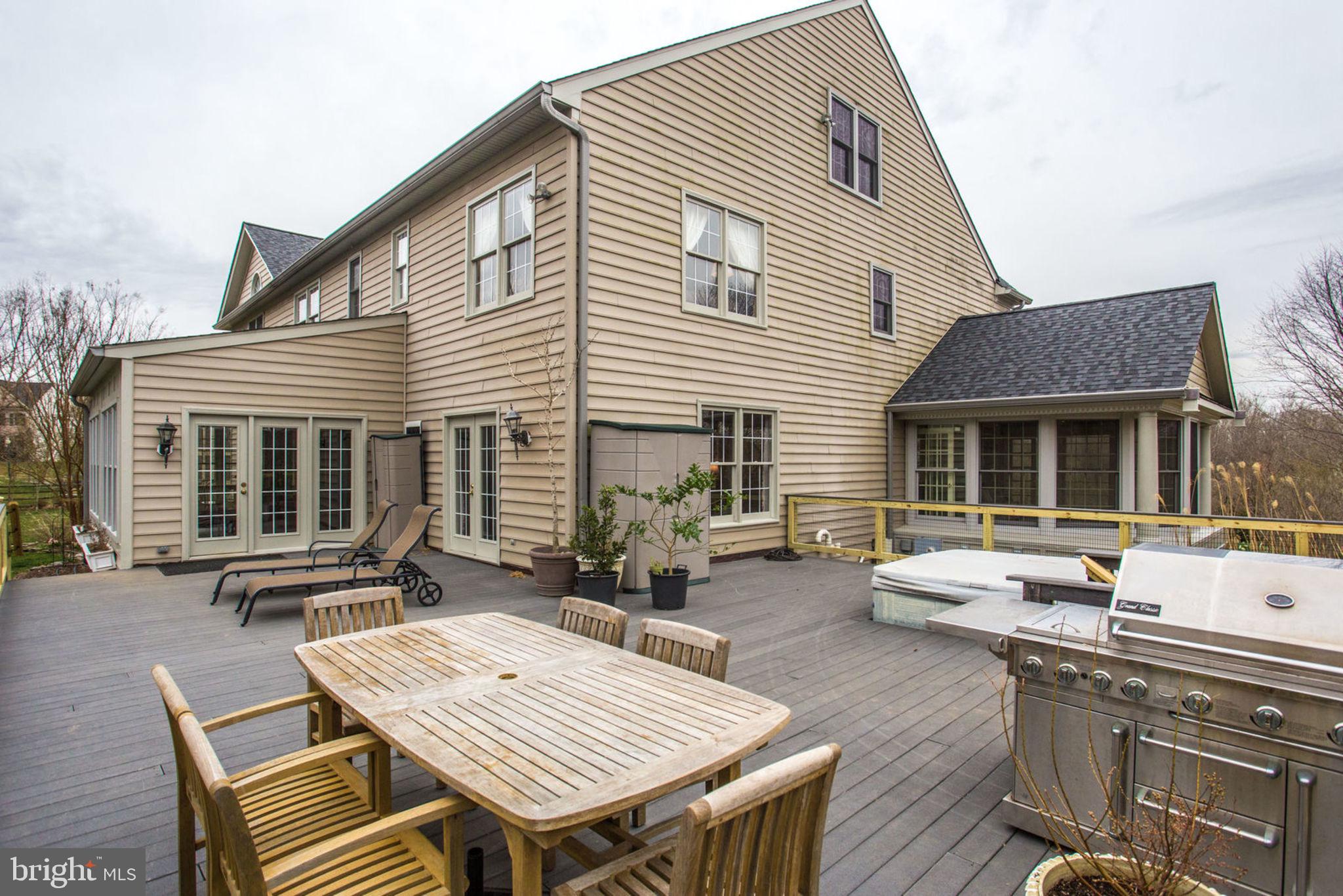 18621 Thundercloud Road Boyds, MD 20841 - Photo 72 of 83 a view of a dinning table and chairs in the patio