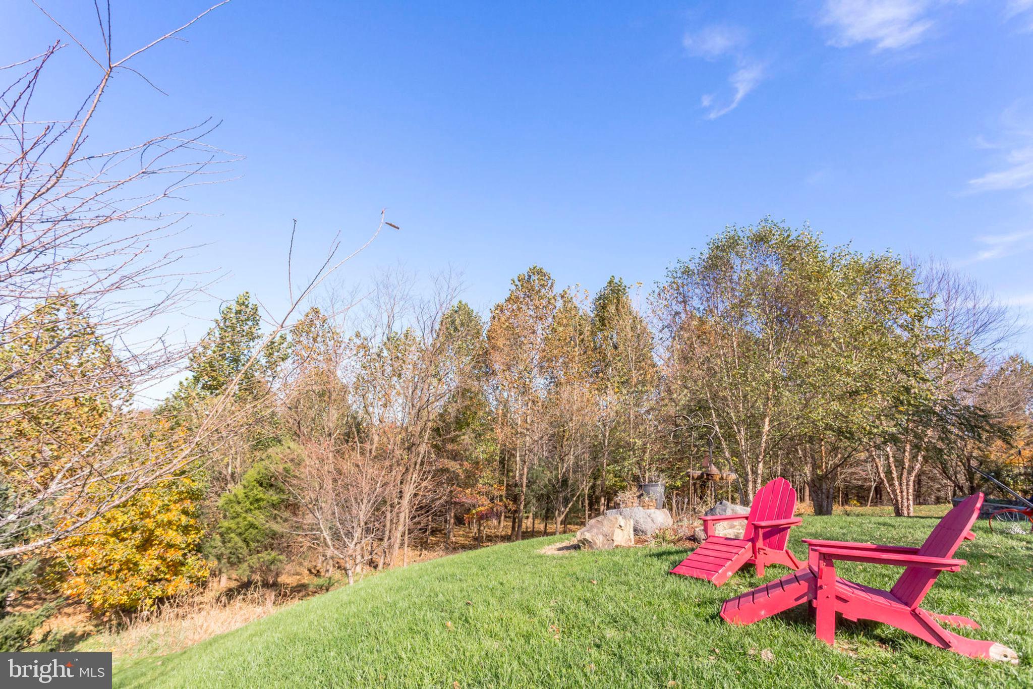 18621 Thundercloud Road Boyds, MD 20841 - Photo 78 of 83 a backyard of a house with seating space