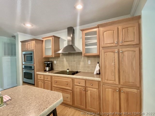 670 Shady Grove Road Carthage, NC 28327 - Photo 10 of 34 a kitchen with stainless steel appliances granite countertop a sink stove and cabinets