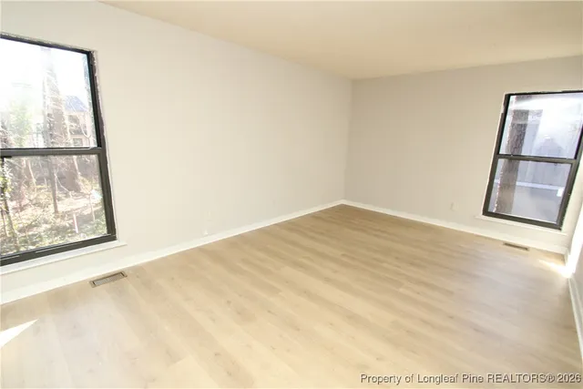 a view of an empty room and window