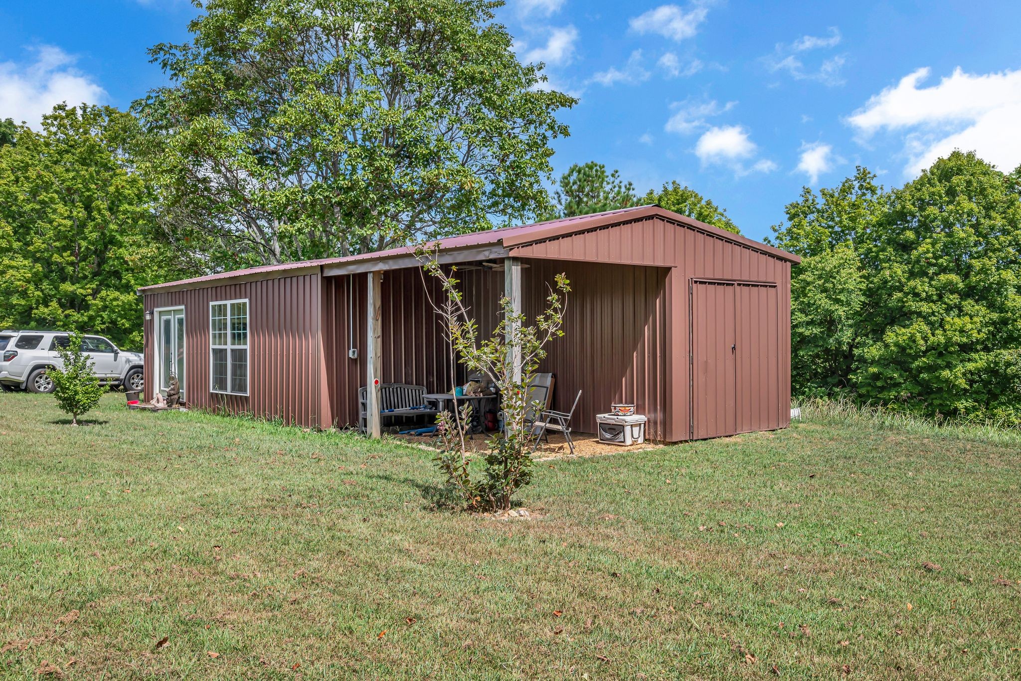 397 West Grinders Switch Road Centerville, TN 37033 - Photo 6 of 48 Covered outdoor area for staying out of the weather plus an enclosed outdoor storage area