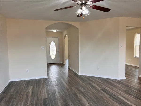 a view of a livingroom with wooden floor