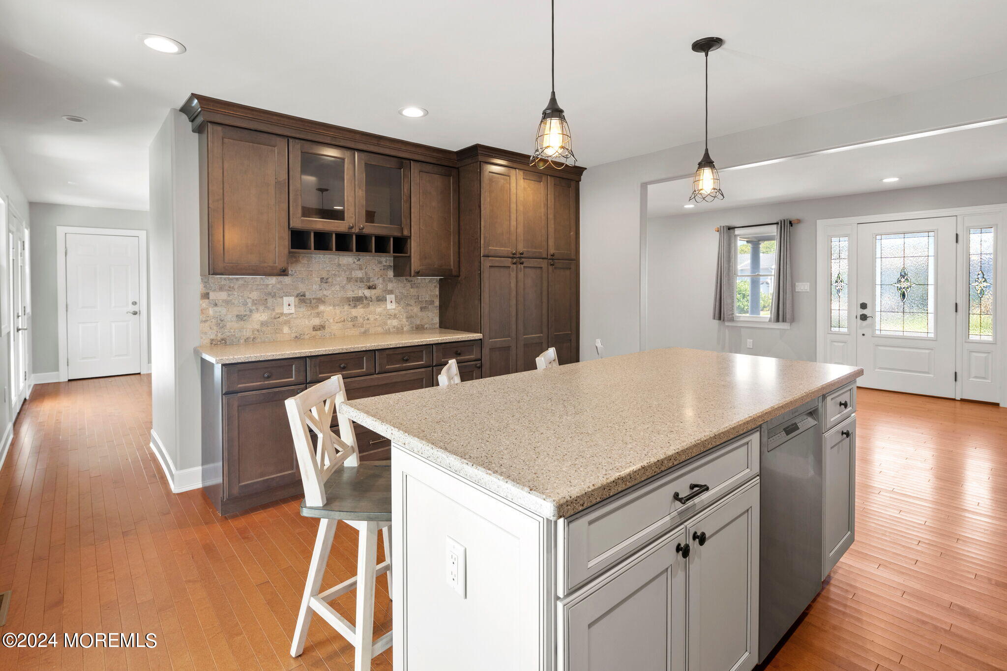 740 Midstreams Road Brick, NJ 08724 - Photo 13 of 31 a kitchen with a table chairs refrigerator and microwave