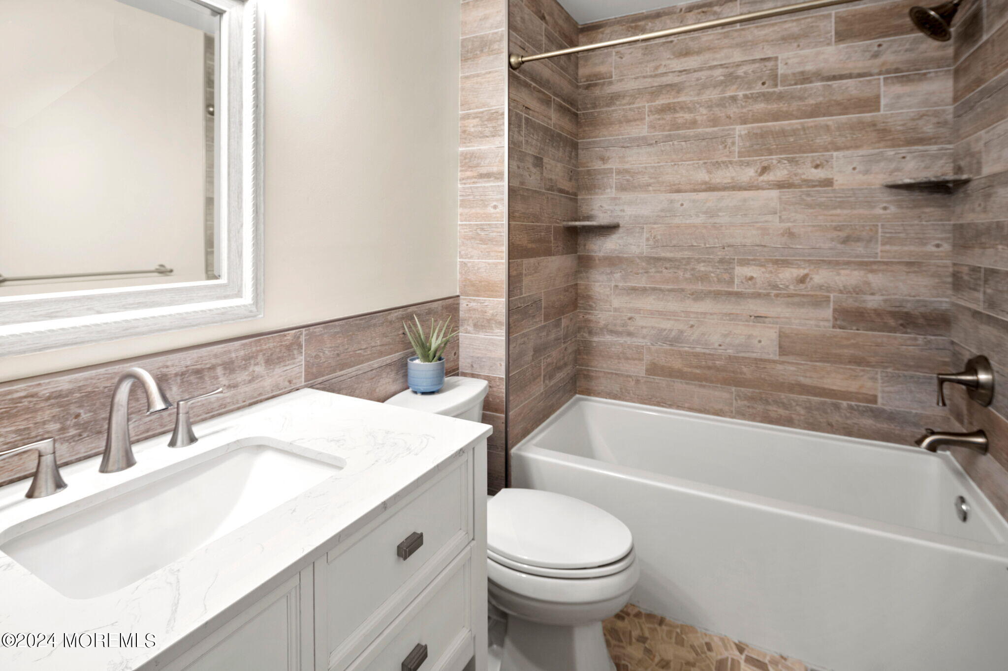 740 Midstreams Road Brick, NJ 08724 - Photo 18 of 31 a bathroom with a sink and a bathtub