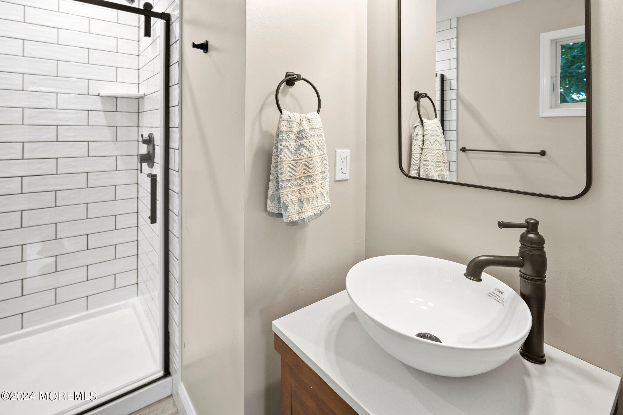 740 Midstreams Road Brick, NJ 08724 - Photo 24 of 31 a bathroom with a sink and mirror