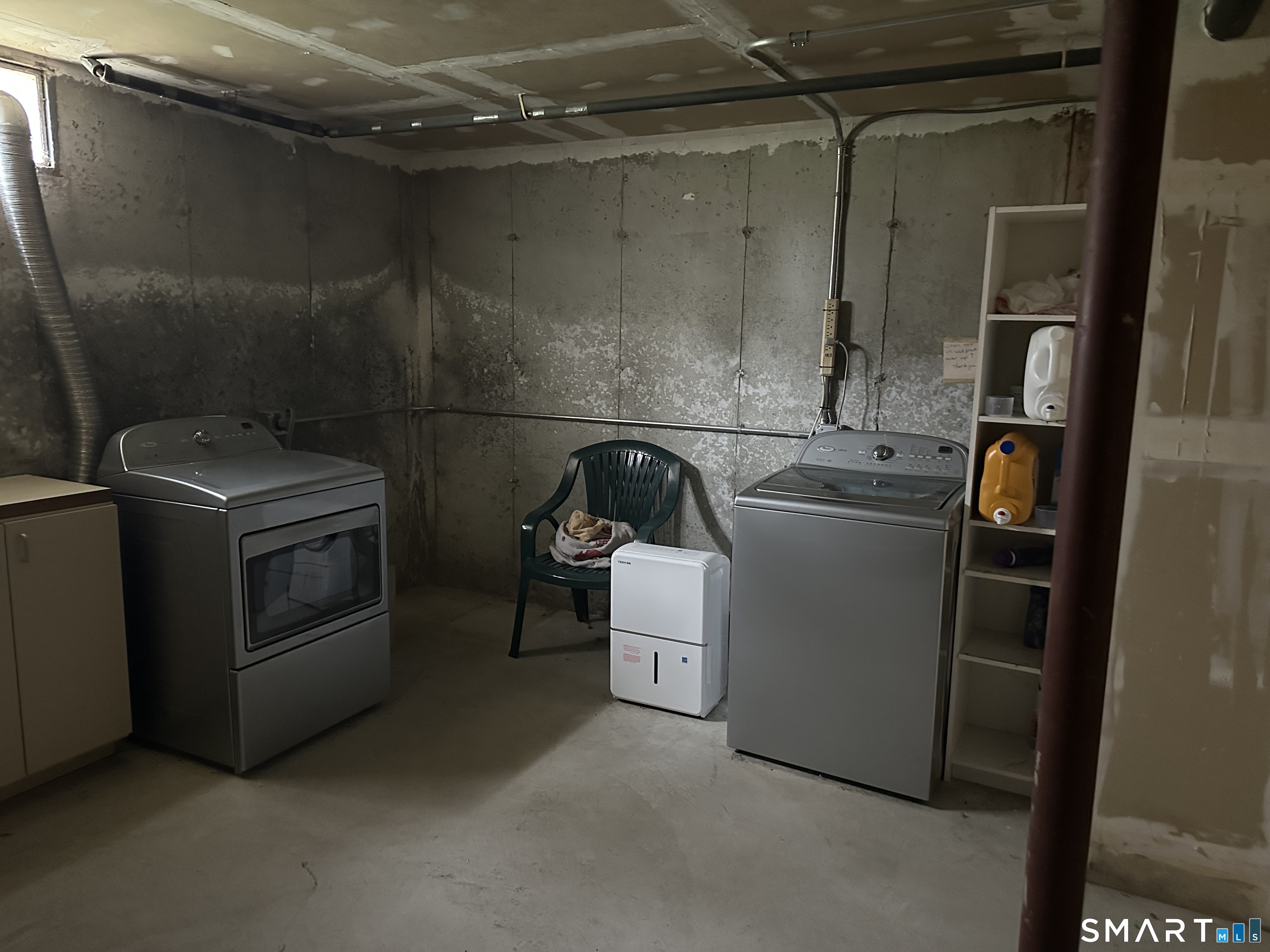 14 Pinney Street, Unit 32 Ellington, CT 06029 - Photo 13 of 14 a utility room with dryer and washer