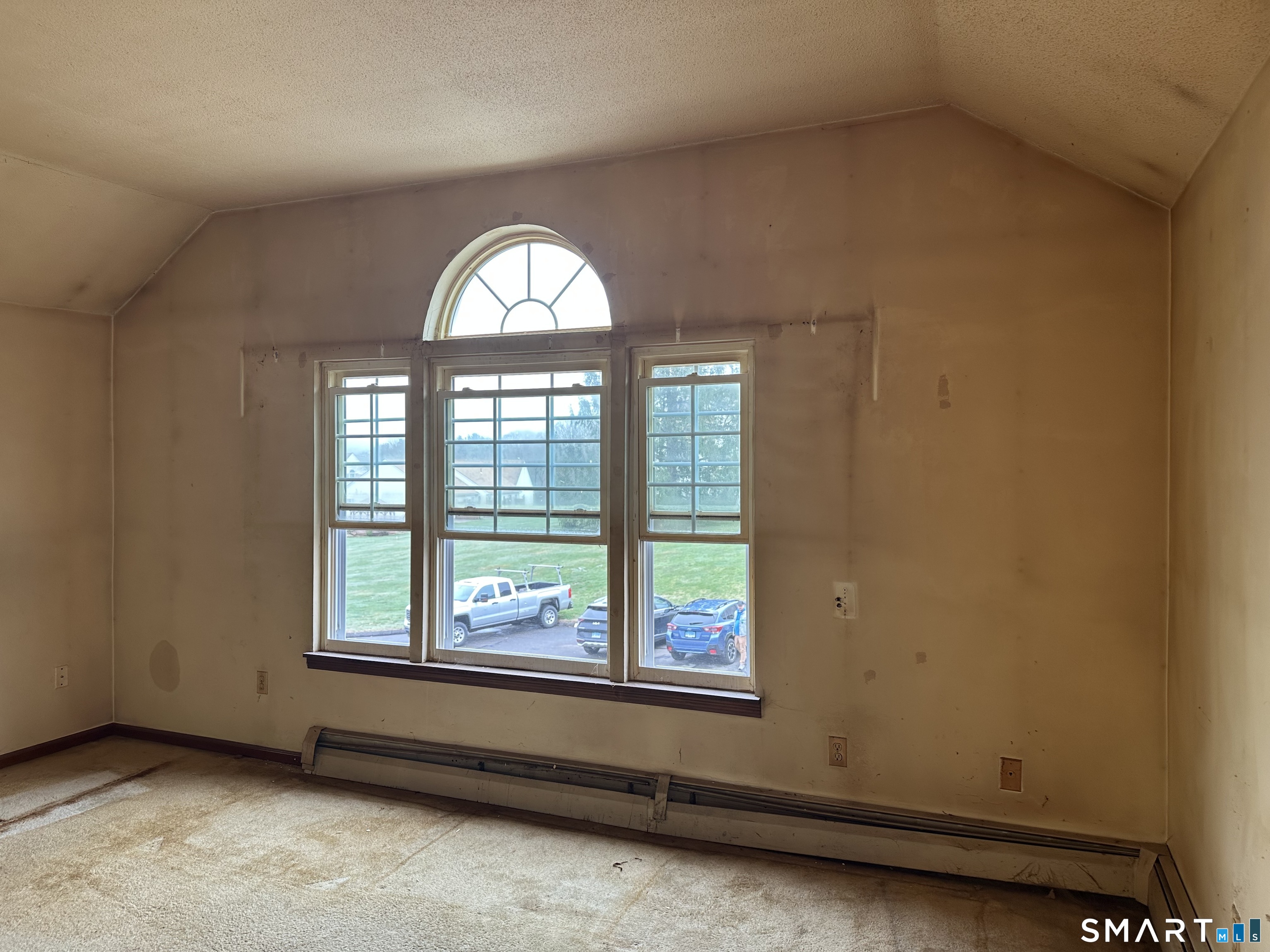 14 Pinney Street, Unit 32 Ellington, CT 06029 - Photo 3 of 14 an empty room with a window