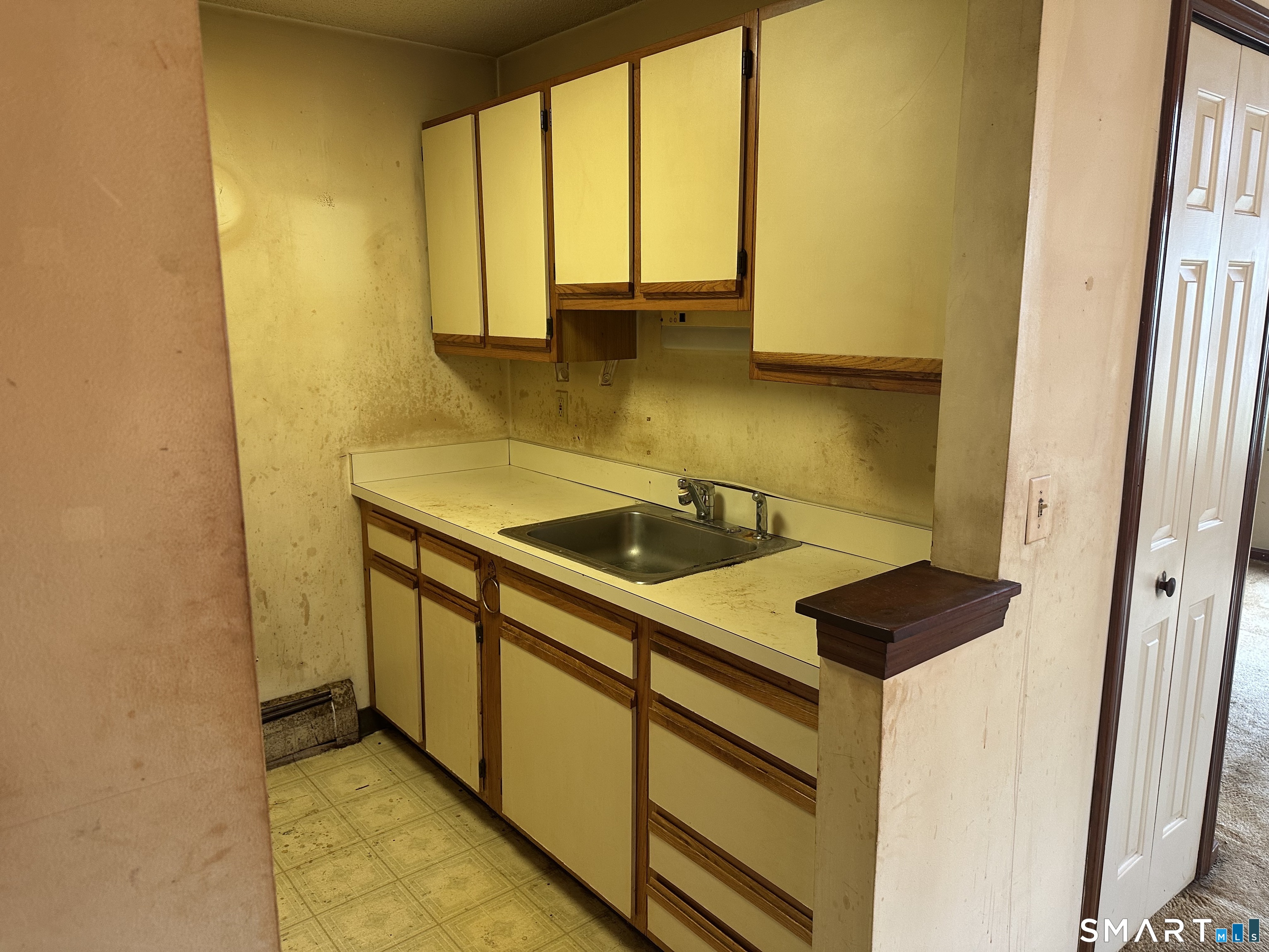 14 Pinney Street, Unit 32 Ellington, CT 06029 - Photo 9 of 14 a view of storage and utility