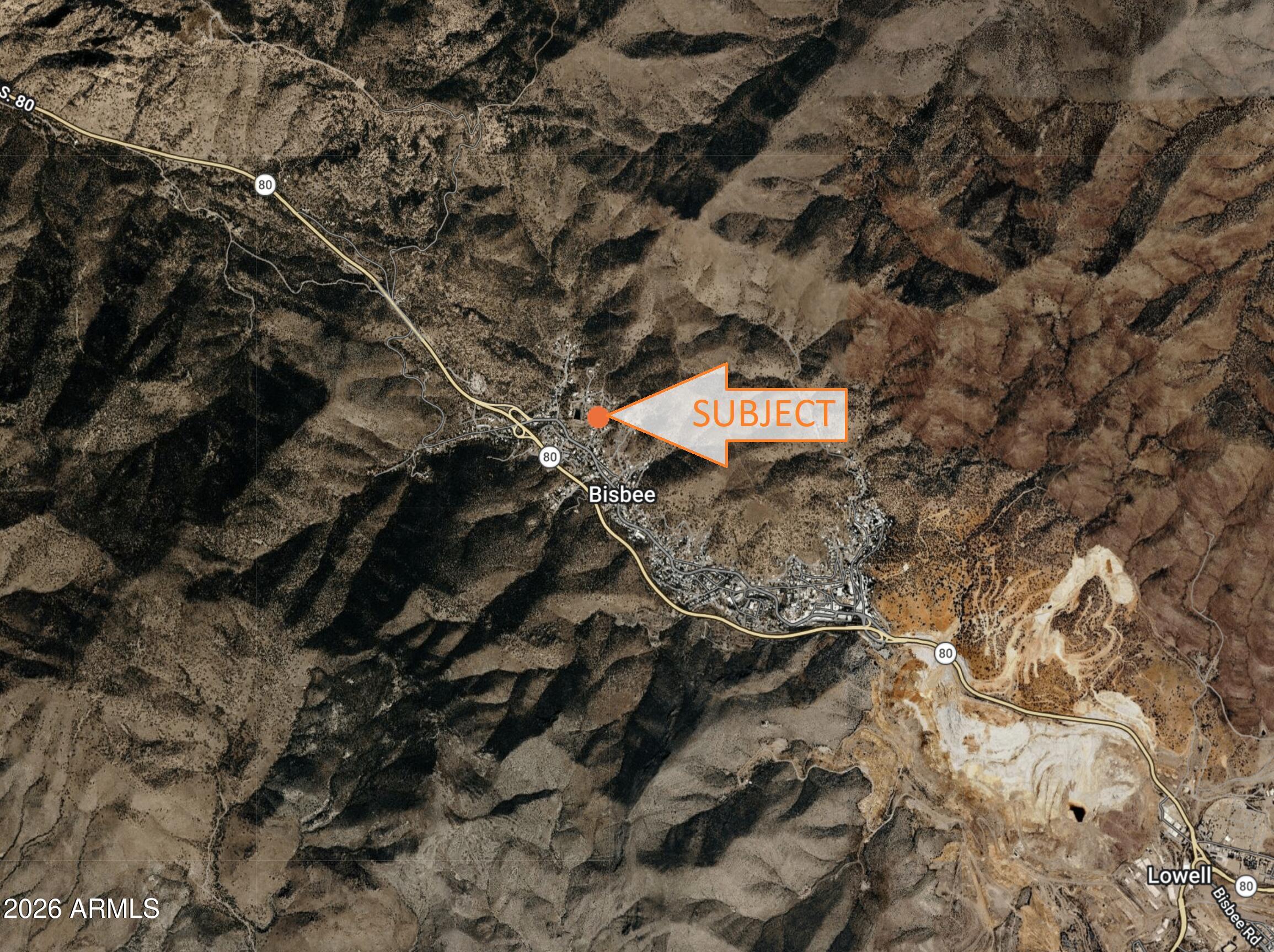 a aerial view of a house with a yard