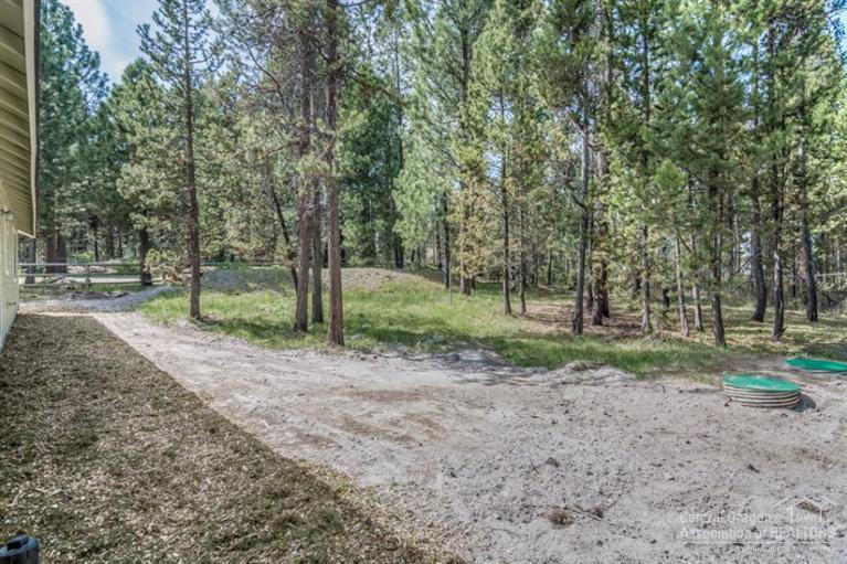 17306 Kingsburg Road Bend, OR 97707 - Photo 17 of 22 a view of a forest with trees