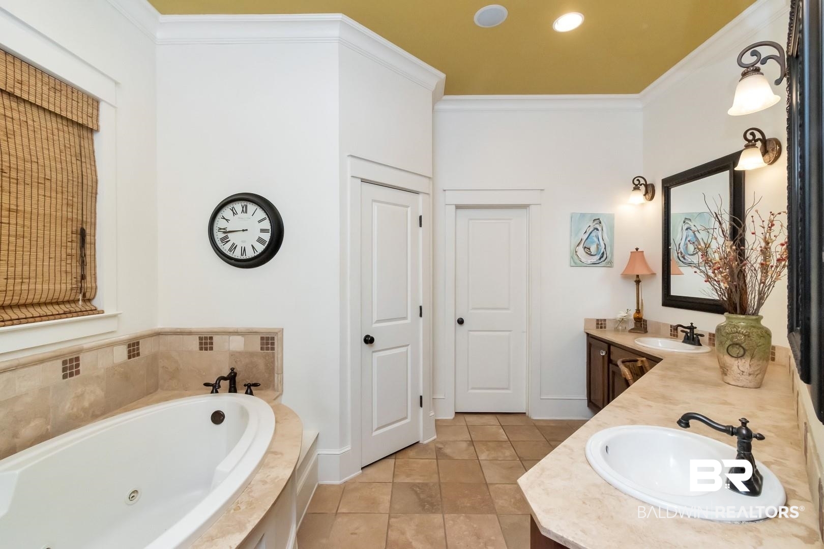 8868 Dawes Lake Road South Mobile, AL 36619 - Photo 17 of 35 Bathroom featuring vanity, ornamental molding, tile patterned floors, and tiled bath