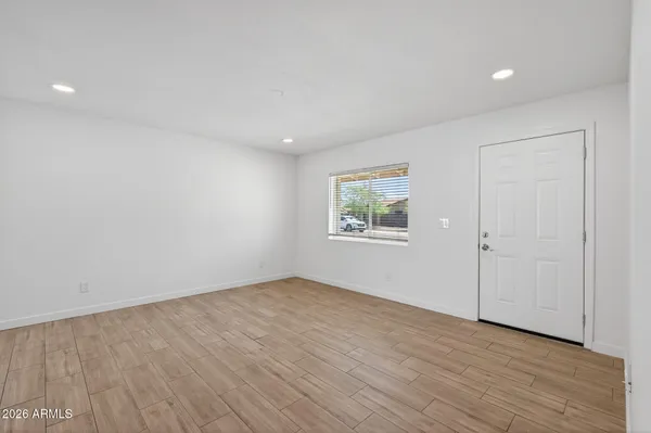 a kitchen with a sink and a stove top oven