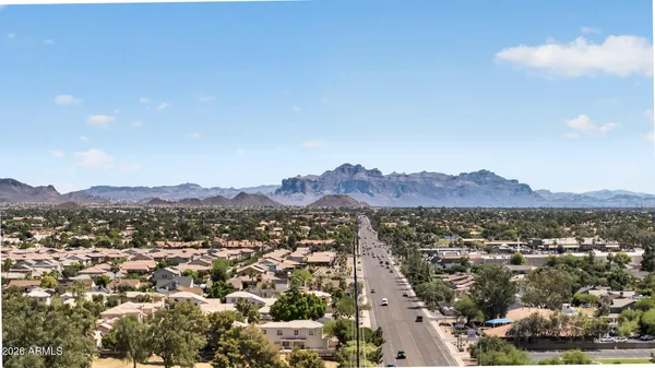 an aerial view of residential houses and a lake view