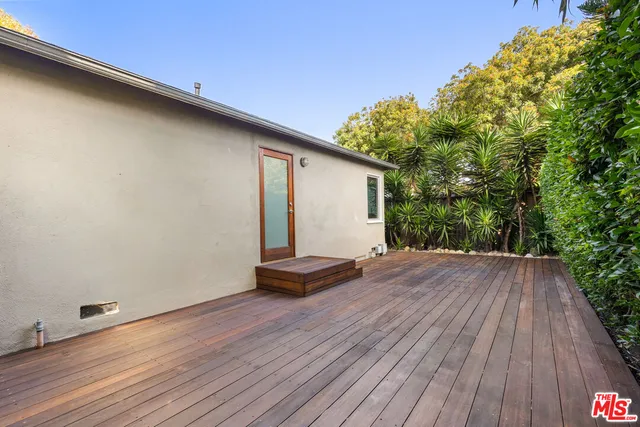 a view of a backyard of a house