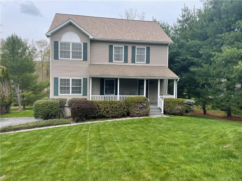 6 Phillard Road Patterson, NY 12563 - Photo 1 of 1 a front of a house with garden