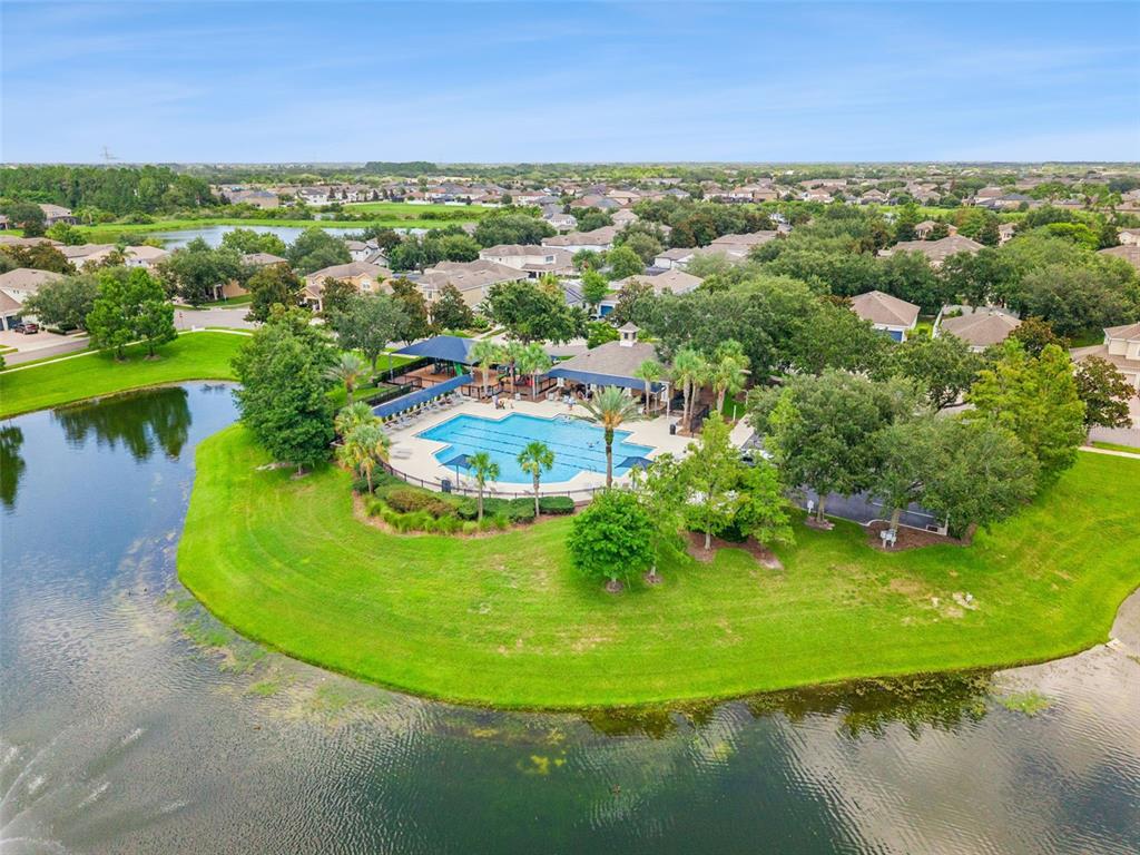 13403 Riggs Way Windermere, FL 34786 - Photo 44 of 47 a view of a lake with a city