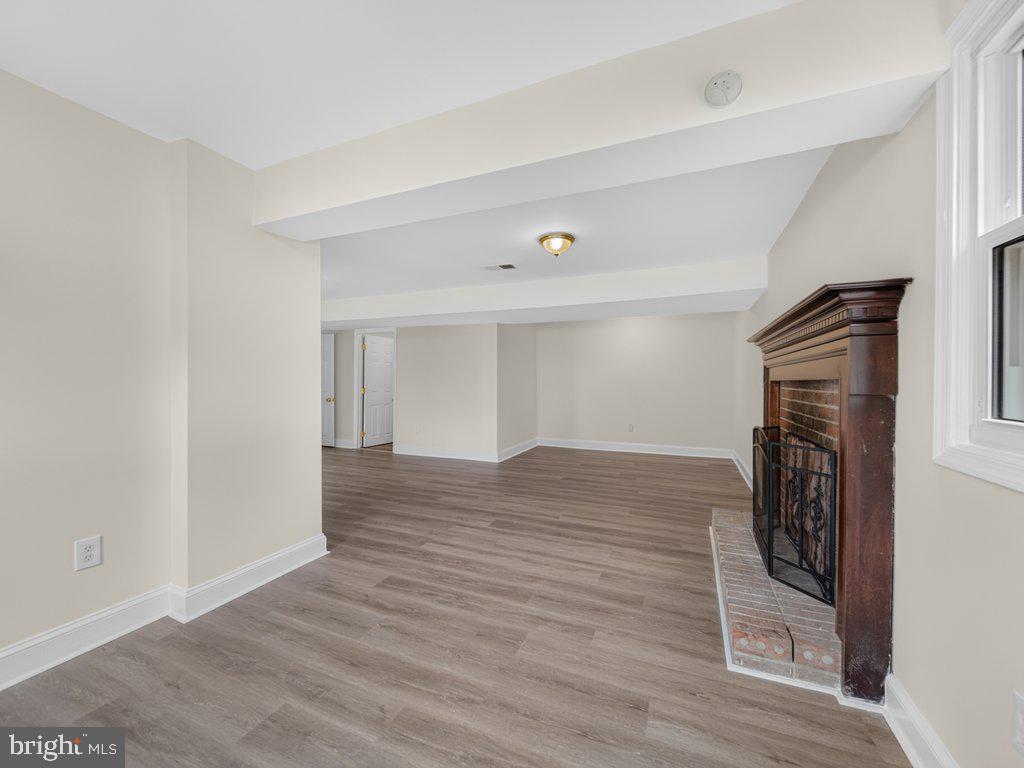 2903 Ivy Bridge Road, Unit N Fort Washington, MD 20744 - Photo 42 of 53 Fireplace equipped basement family room