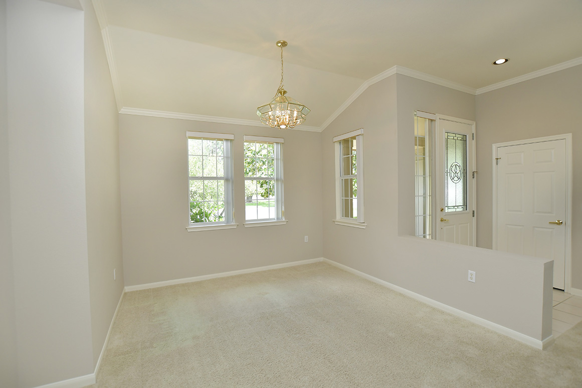 114 Lone Star Drive Georgetown, TX 78633 - Photo 7 of 30 Off the entry is the dining room with a double window adding light and views to the front yard.