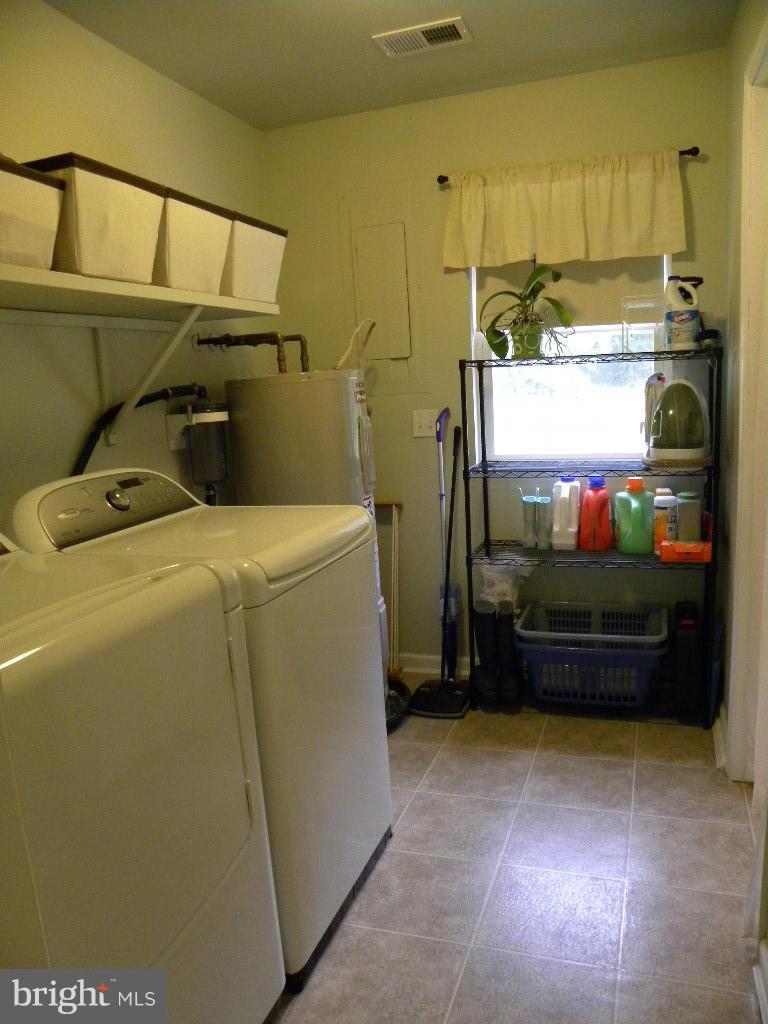2414 Busic Church Road Marydel, MD 21649 - Photo 19 of 30 a utility room with dryer and washer