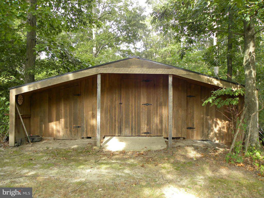 2414 Busic Church Road Marydel, MD 21649 - Photo 25 of 30 a backyard of a house