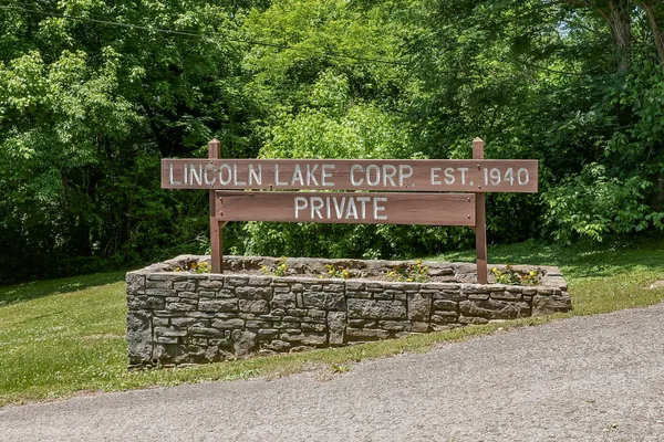 a sign that is on the side of a road