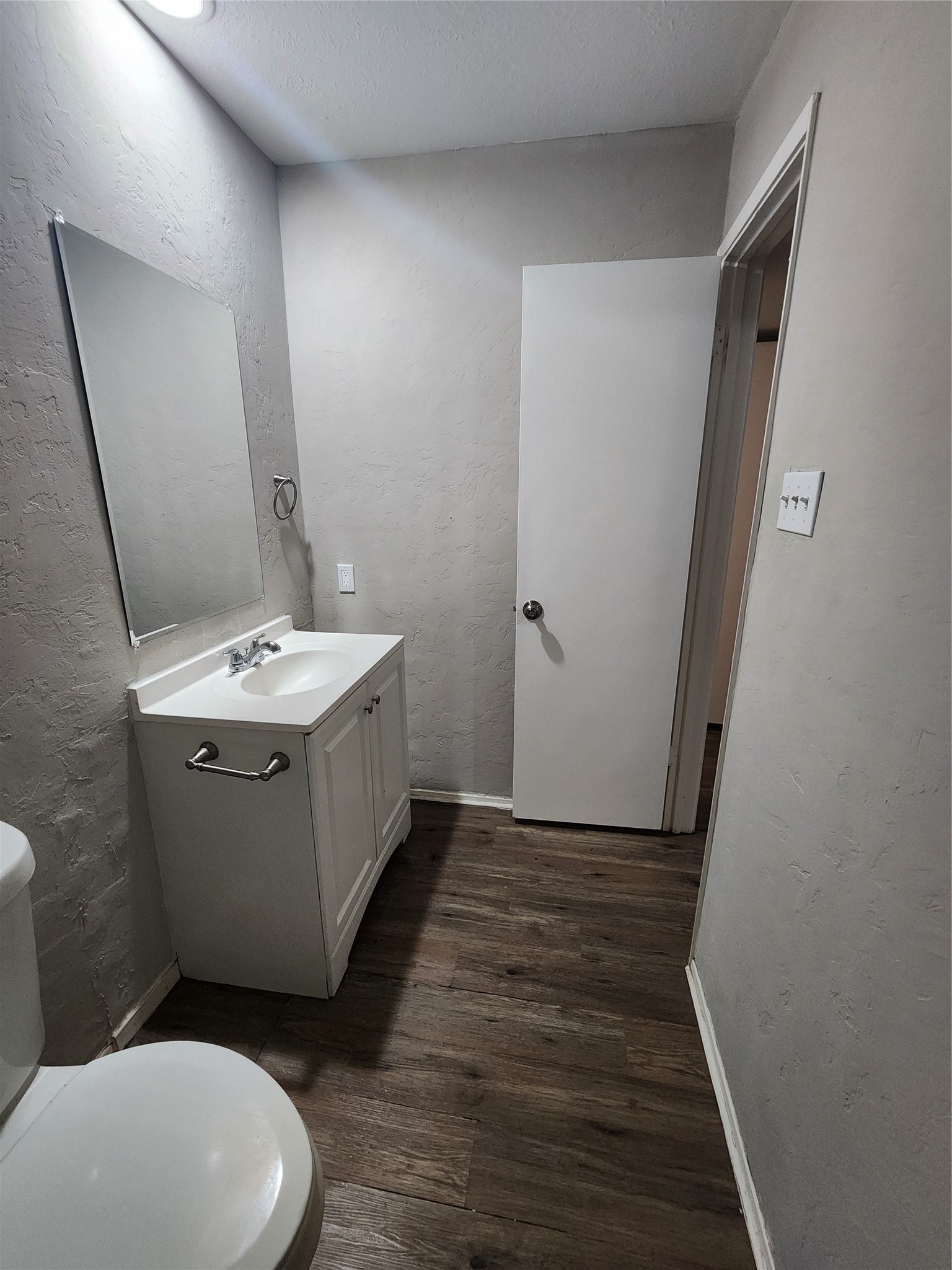 3822 Broken Elm Drive Spring, TX 77388 - Photo 13 of 25 a bathroom with a sink a toilet and mirror