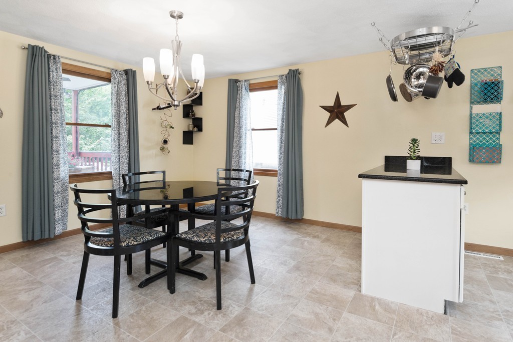 26 Harvard Road Billerica, MA 01821 - Photo 3 of 29 a view of a dining room with furniture and chandelier