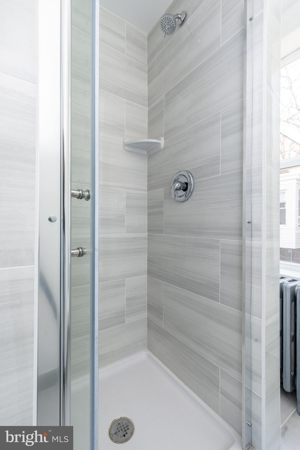 2143 Palethorp Street Philadelphia, PA 19122 - Photo 18 of 27 a bathroom with a shower