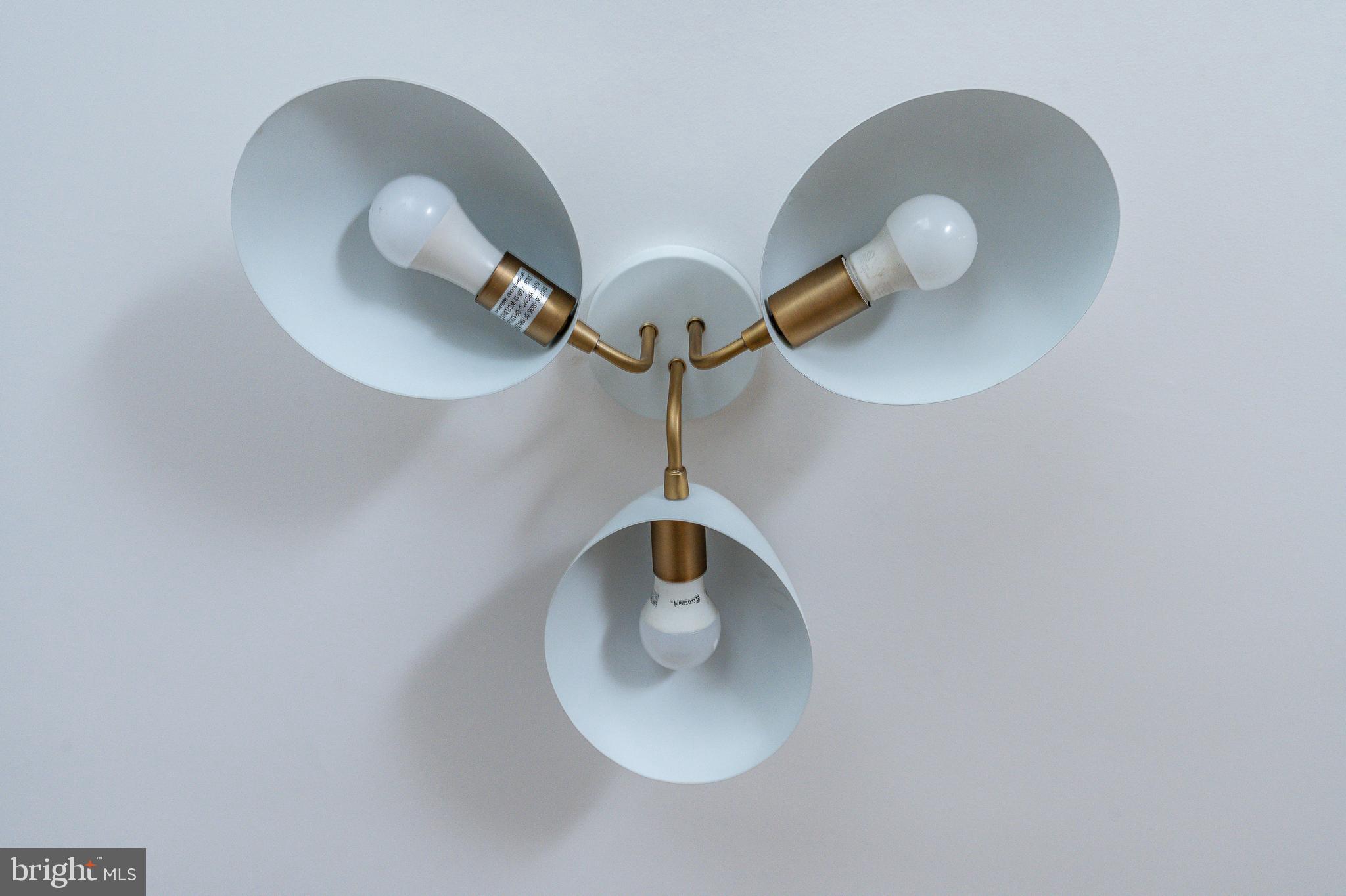 2143 Palethorp Street Philadelphia, PA 19122 - Photo 8 of 27 a close view of light fixtures and wooden floor