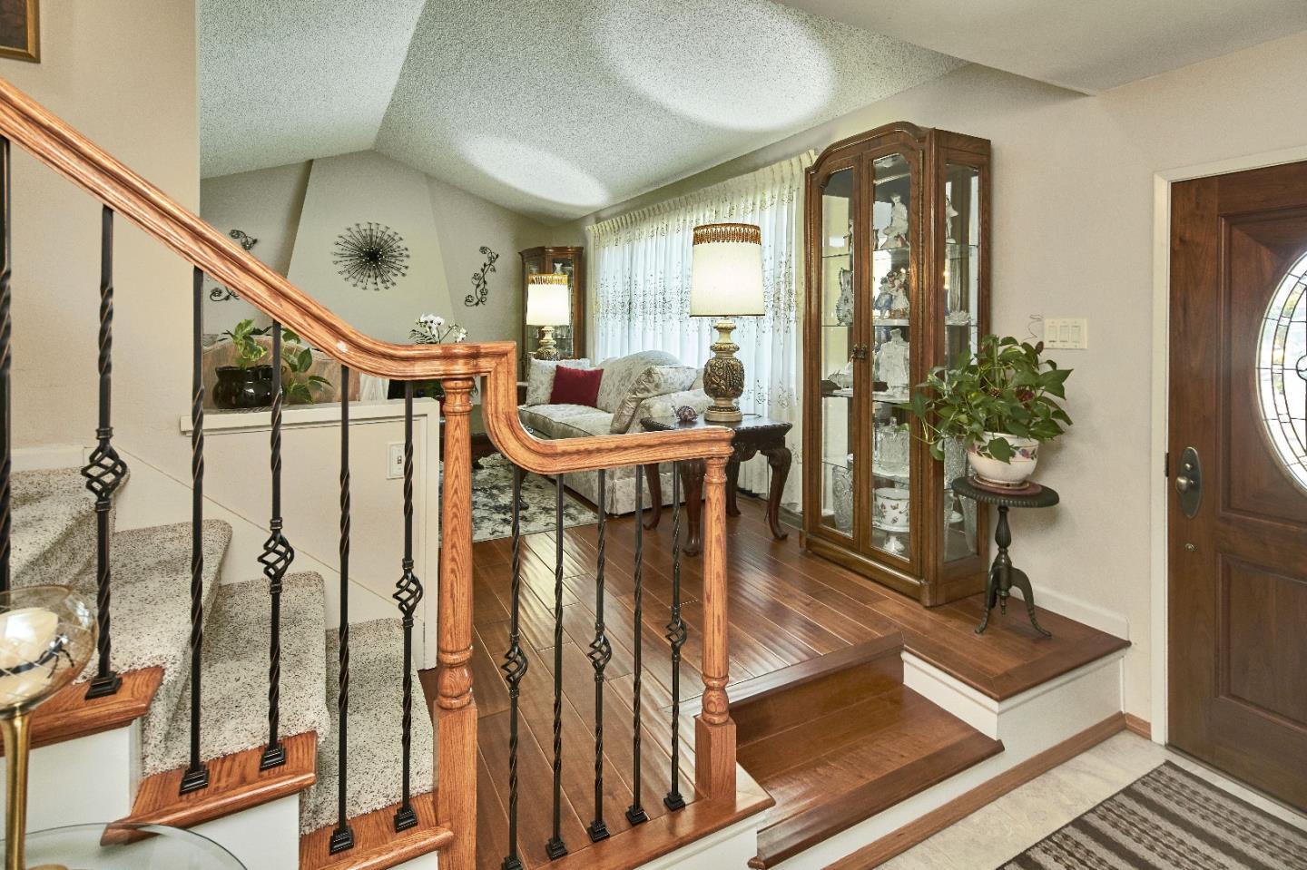 763 Upton Way San Jose, CA 95136 - Photo 18 of 32 a view of a hallway with furniture and entryway