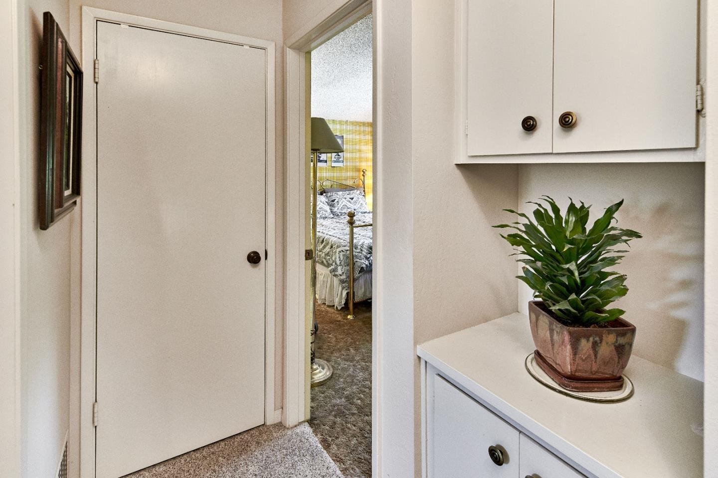 763 Upton Way San Jose, CA 95136 - Photo 20 of 32 a close view of dining table with potted plant in front of a window