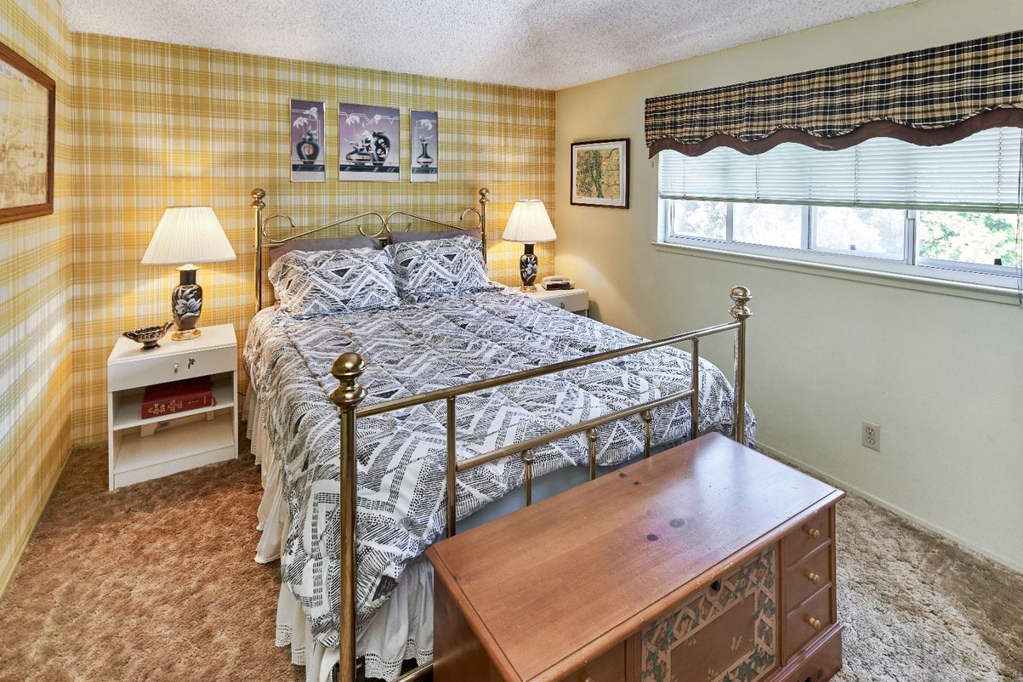 763 Upton Way San Jose, CA 95136 - Photo 23 of 32 a bedroom with a bed and a dresser next to it