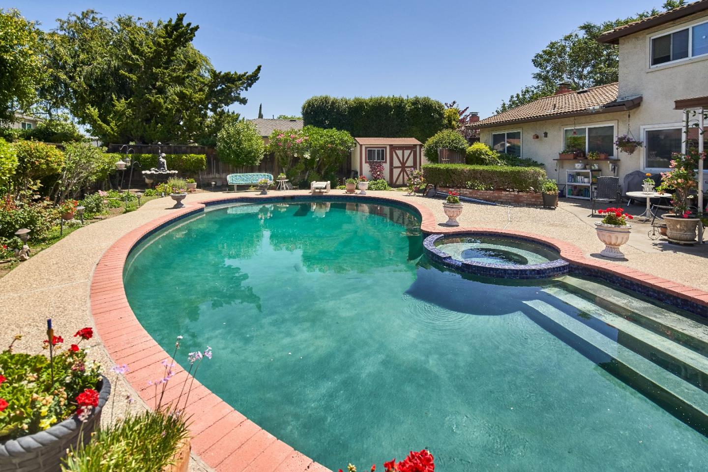 763 Upton Way San Jose, CA 95136 - Photo 28 of 32 a view of a swimming pool with a patio