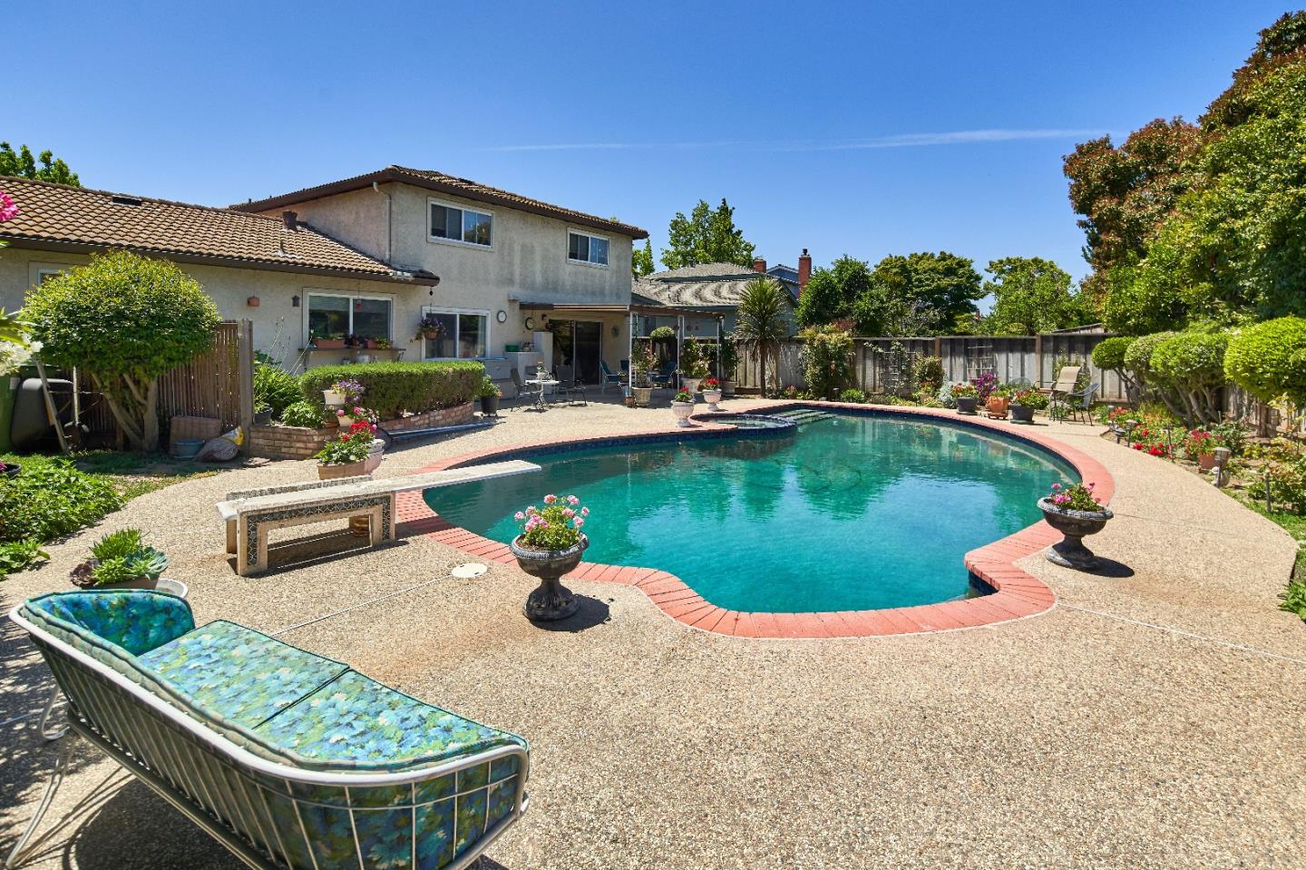 763 Upton Way San Jose, CA 95136 - Photo 29 of 32 a view of a house with swimming pool and porch