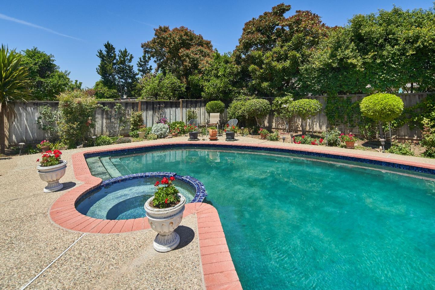 763 Upton Way San Jose, CA 95136 - Photo 31 of 32 a view of a swimming pool with a patio