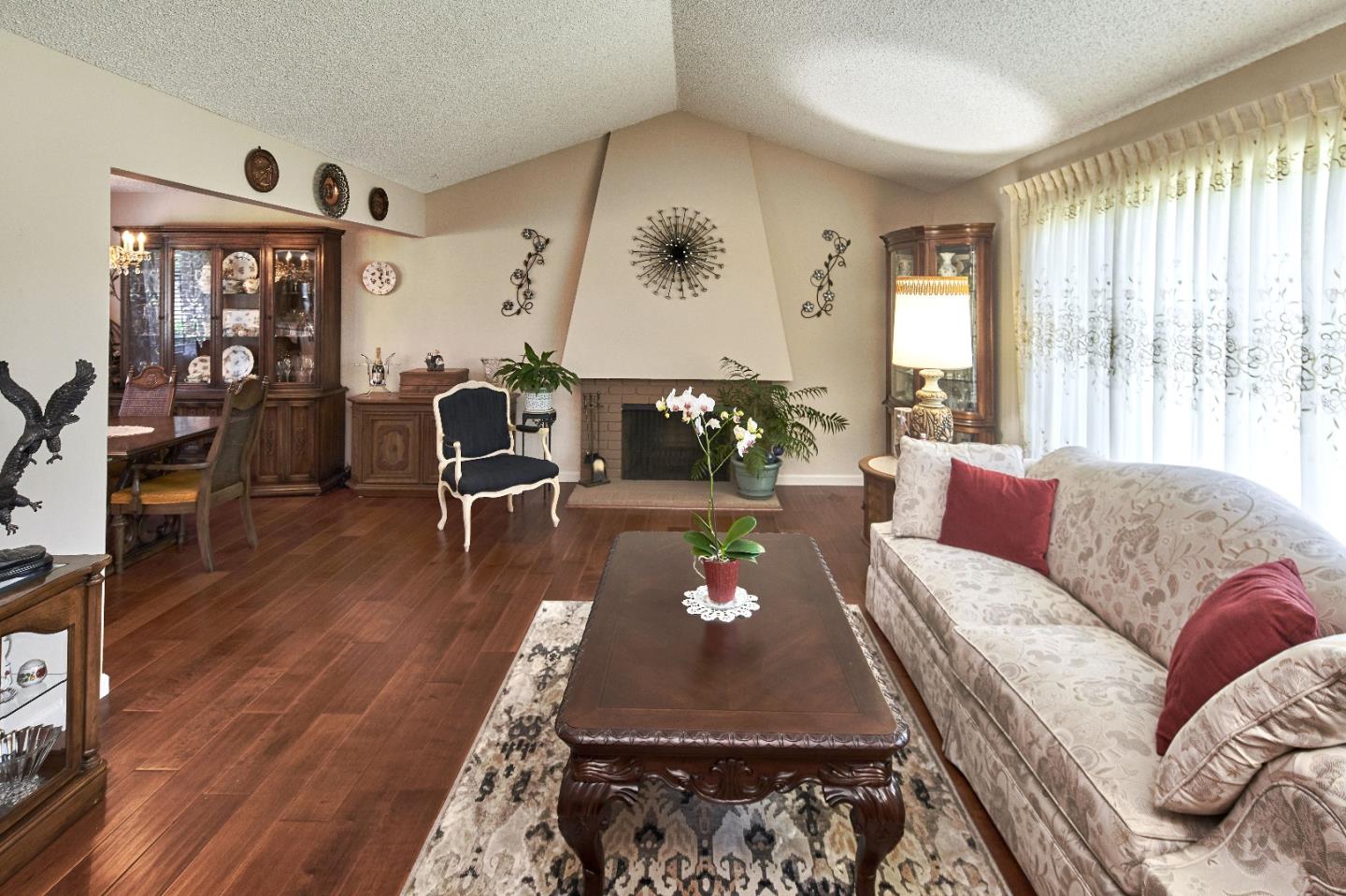 763 Upton Way San Jose, CA 95136 - Photo 6 of 32 a living room with furniture and a wooden floor