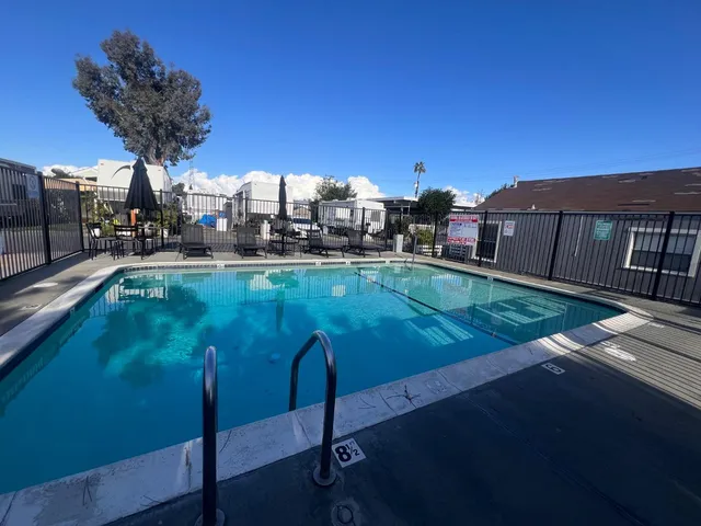 a outdoor space with lots of white furniture