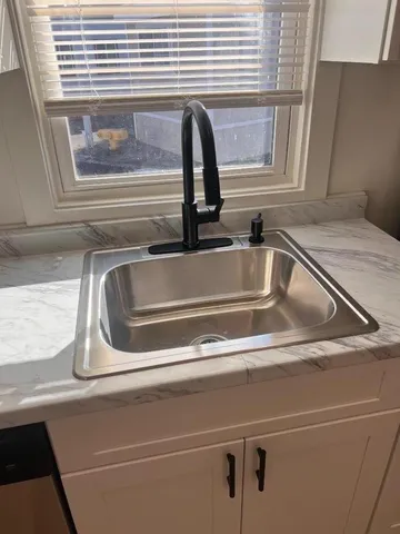 a close view of sink and tap