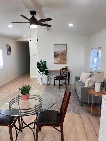a bathroom with a toilet sink and shower