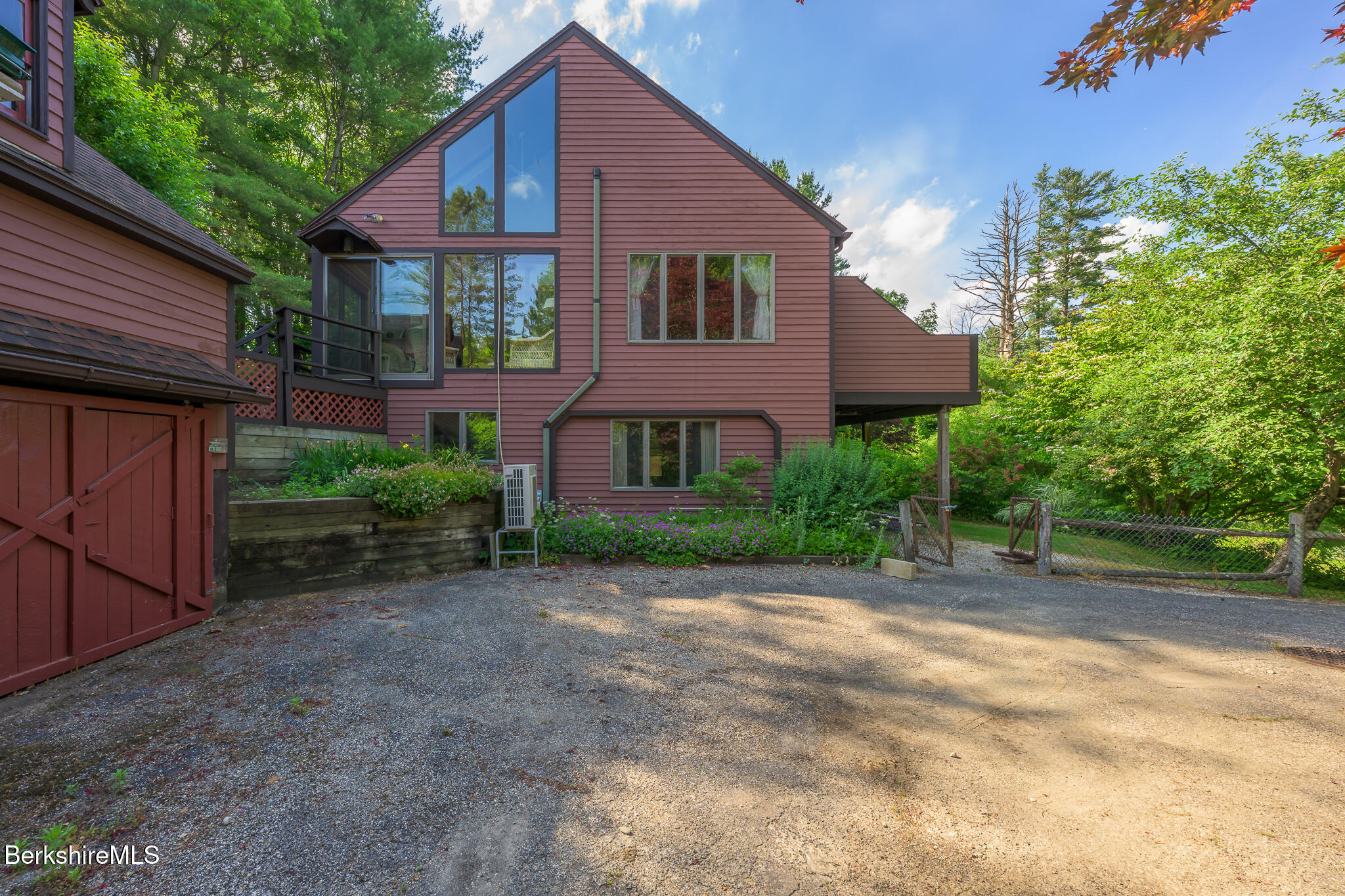 6 Manitauk Heights Stockbridge, MA 01262 - Photo 5 of 49 lower side of Garage and house